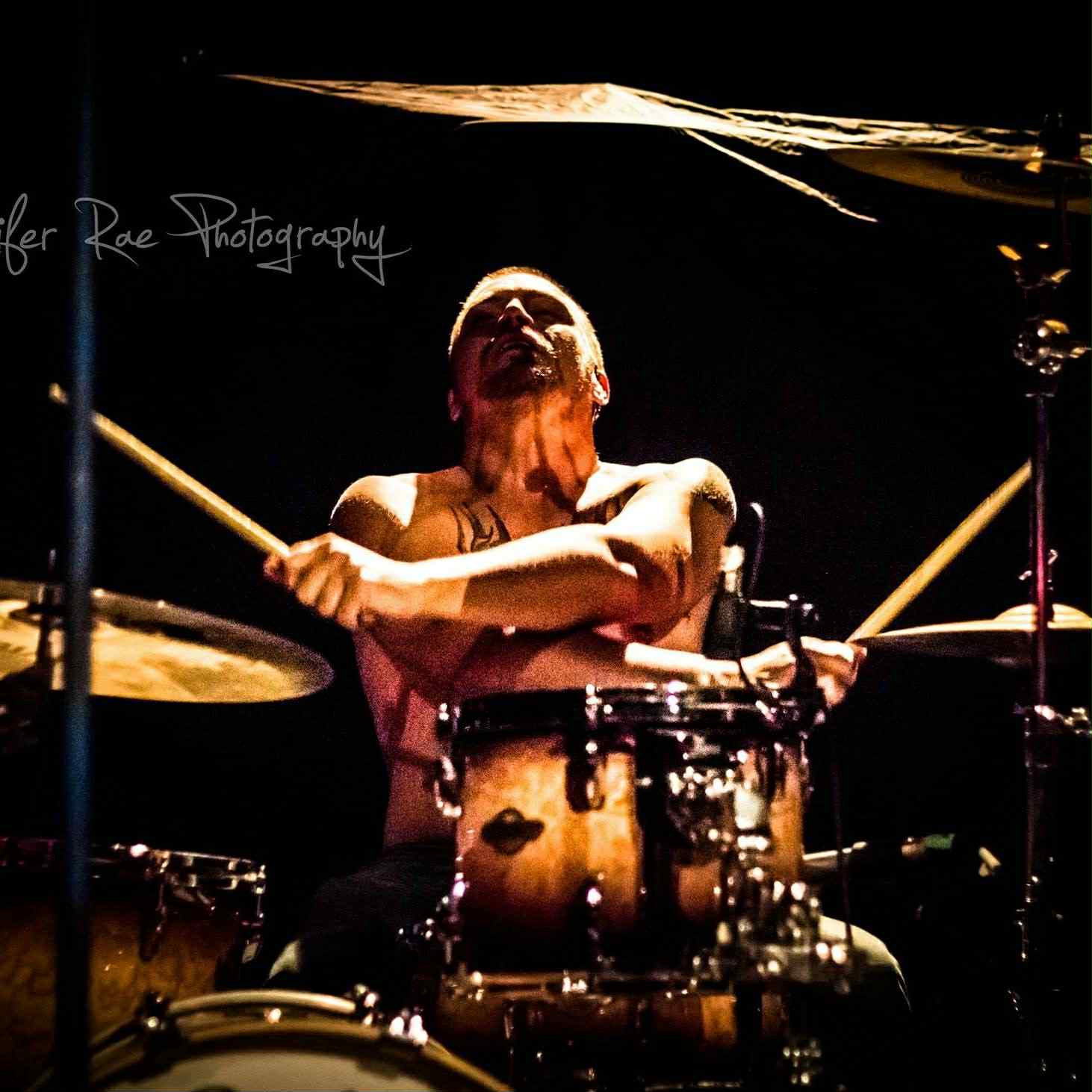 Mike Staus playing drums live